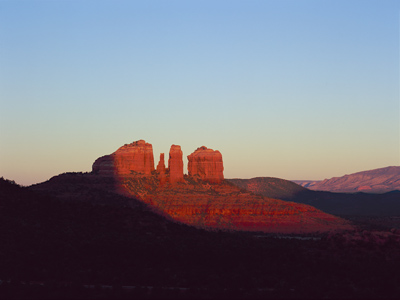 Sunrise on Cathedral Rock as seen from Baby  Bell Rock
