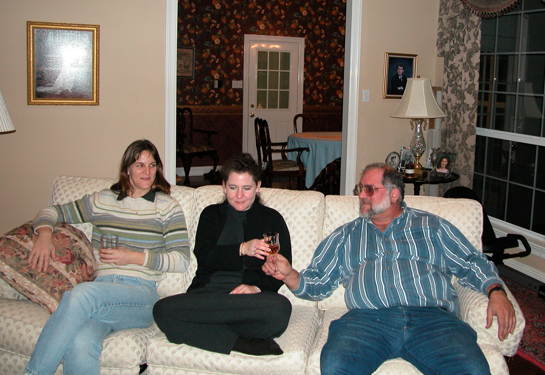 Joan, Jackie and Mike Gold toasting Christmas Eve in Mom's living room