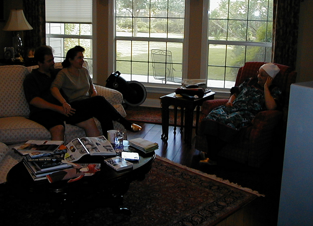 Steve and Jackie and Mom relaxing in Mom's living room
