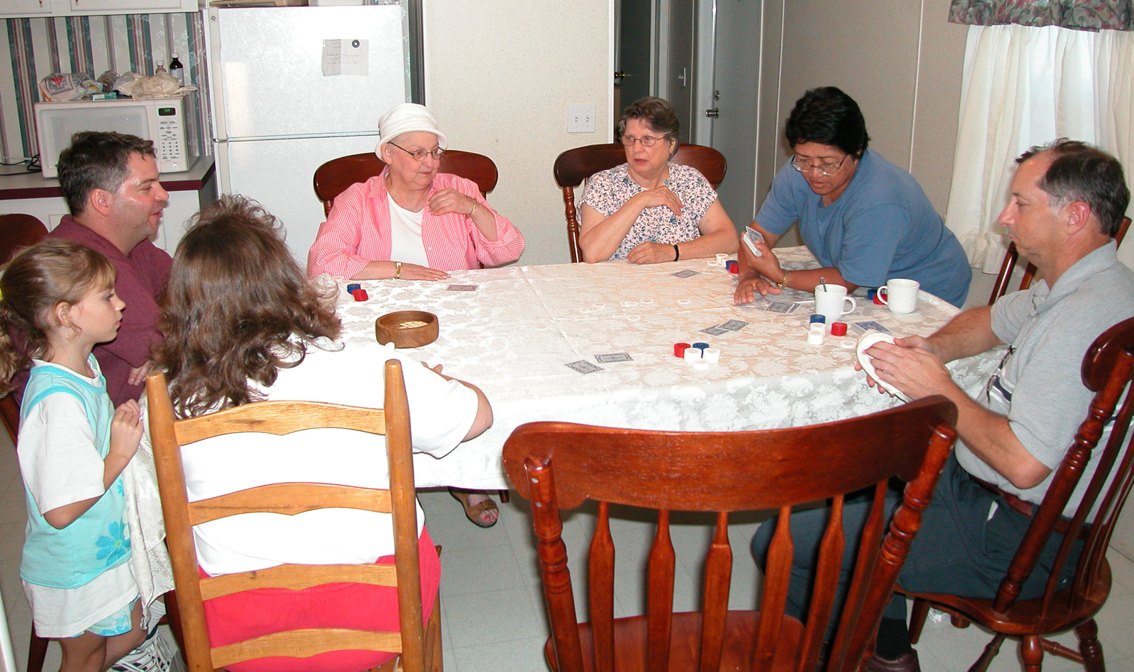 Jessica, Louis, Monica, Mom, Aunt Dory, Gai and Felix playing cards at Louis and Monica's place