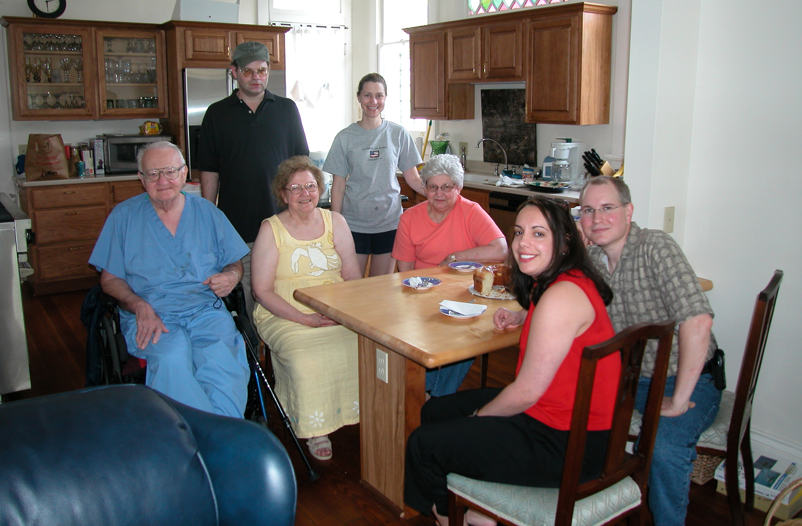 Uncle Norman, Charlie (standing), Aunt Nell, Jennifer (standing), Mom, Dara, and Marc in Jennifer's kitchen