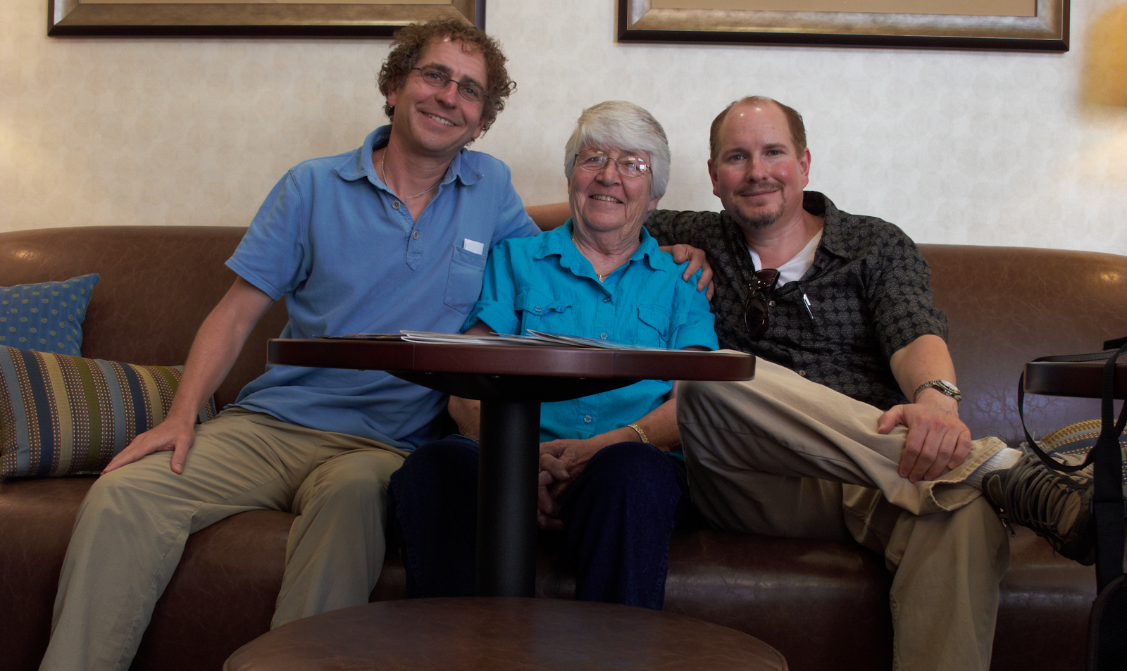 Me, Aunt Pat, and Marc sitting in the lobby of our hotel room