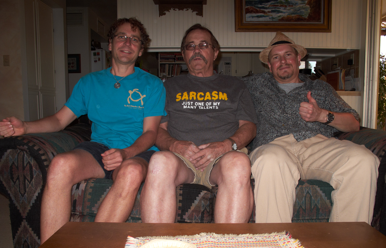 Me, Uncle Bill, and Marc sitting on Uncle Bill's sofa
