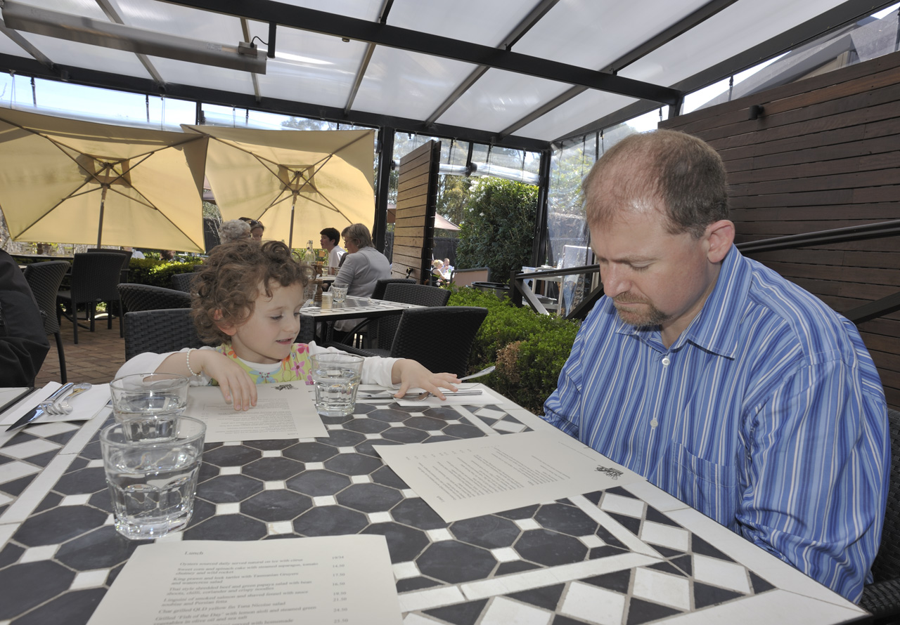 Sophia and Steve contemplating the menu at the COOK'S GARDEN® restaurant