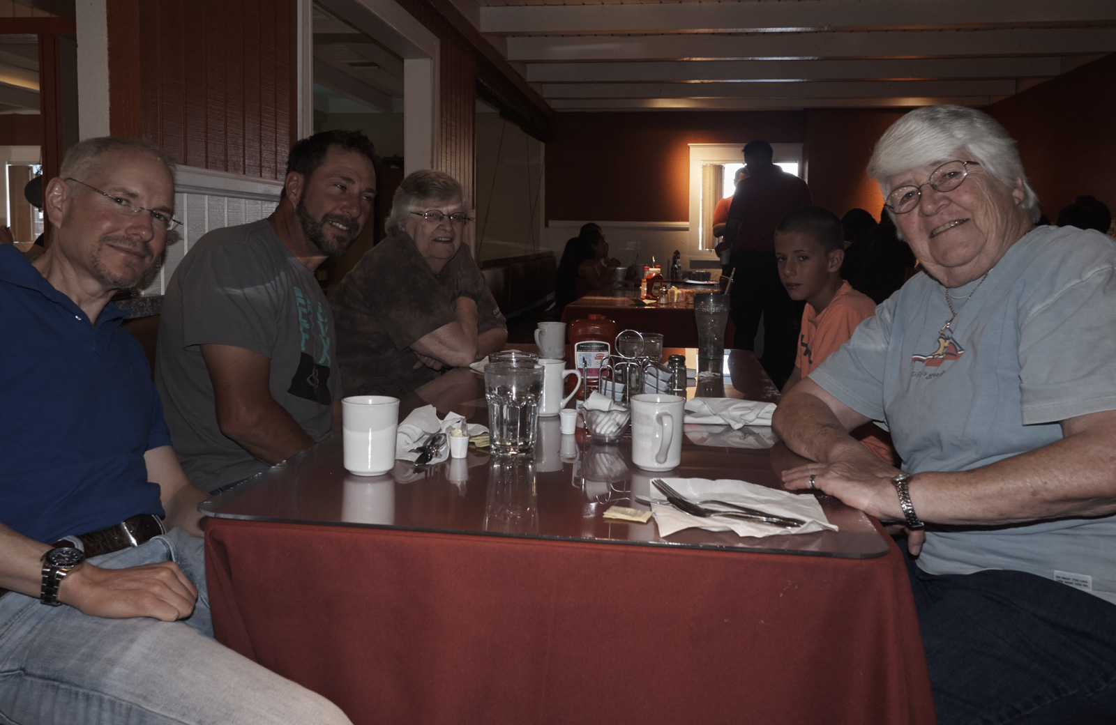 Marc, Tom, MarLyn, Hunter, and Aunt Pat waiting for breakfast at LUGO'S restaurant