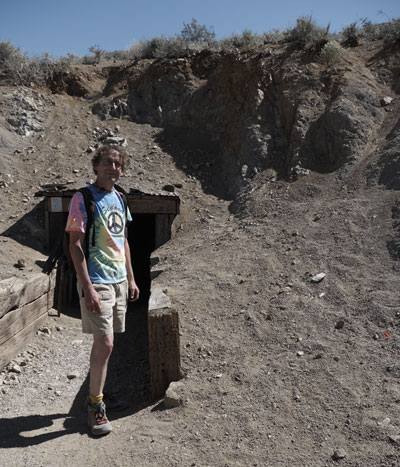 Me standing in front of the entrance to the Burro Schmidt Tunnel in El Paso Mountains Wilderness