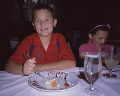 John and Sophia enjoying Jackie's Birthday desserts at FOGO DE CHAO
