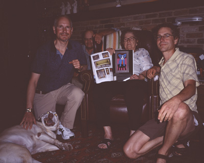 Charlie's dog Molly, Marc, Charlie sitting behind Aunt Nell, Aunt Nell, and Dan in Aunt Nell and Uncle Norman's living room