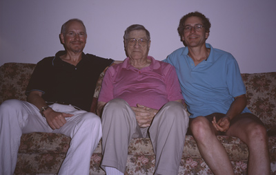 Marc, Uncle Jimmy, and Dan sitting on Uncle Jimmy's sofa