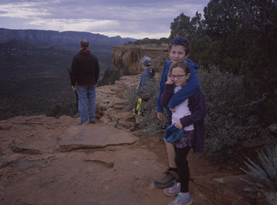 Steve, James, John, and Sophia looking over the east edge of Doe Mesa at Sedona