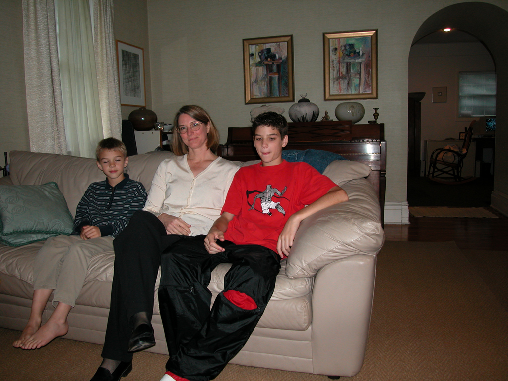 Elliott, Mary Anne, and Christopher at their home
